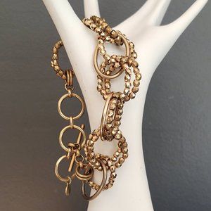 Gold metal link and textured link bracelet